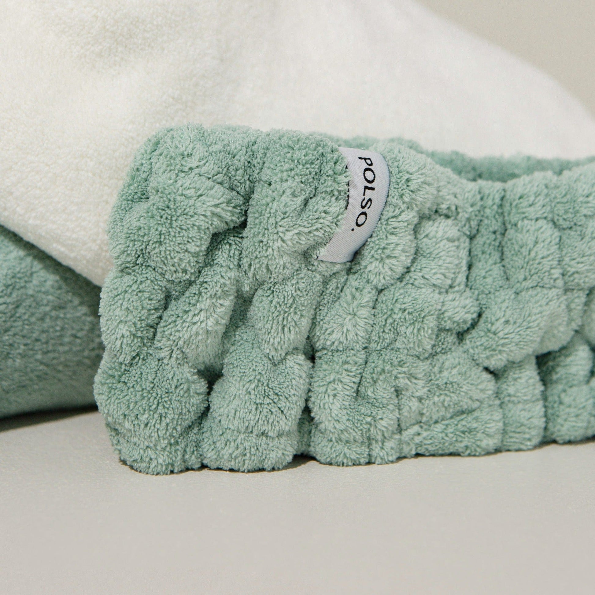 Sage Green Spa Headband for washing face product image close up next to Hair Turban