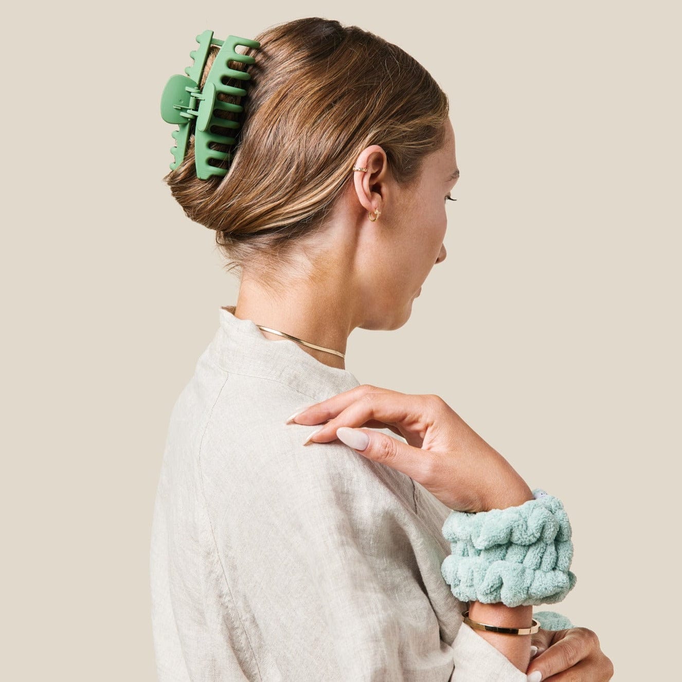 sage green Wash cuffs on model