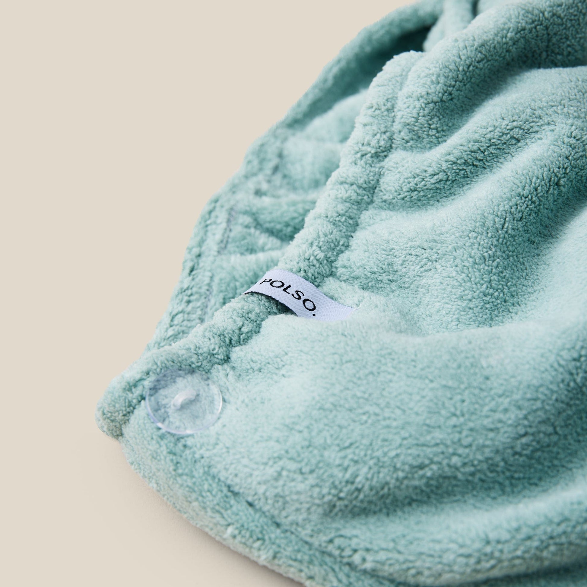 POLSO Sage Green Hair Turban Close up Showing Label and Button